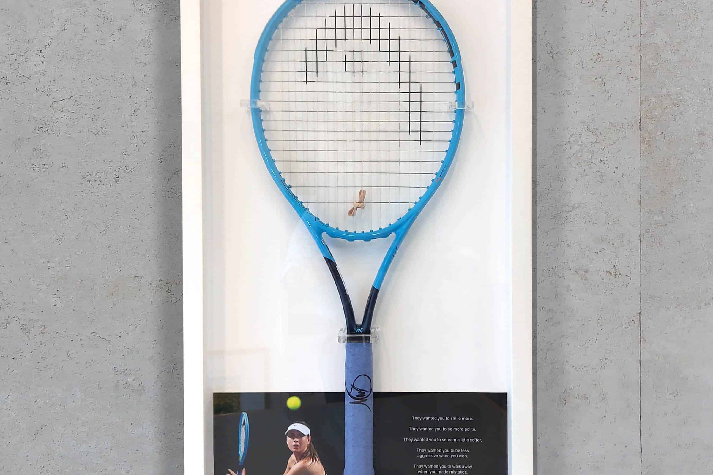 Lee Wah Framing signed tennis racket framed in a white box frame